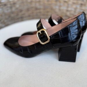 J .Crew size 8 , black leather .
